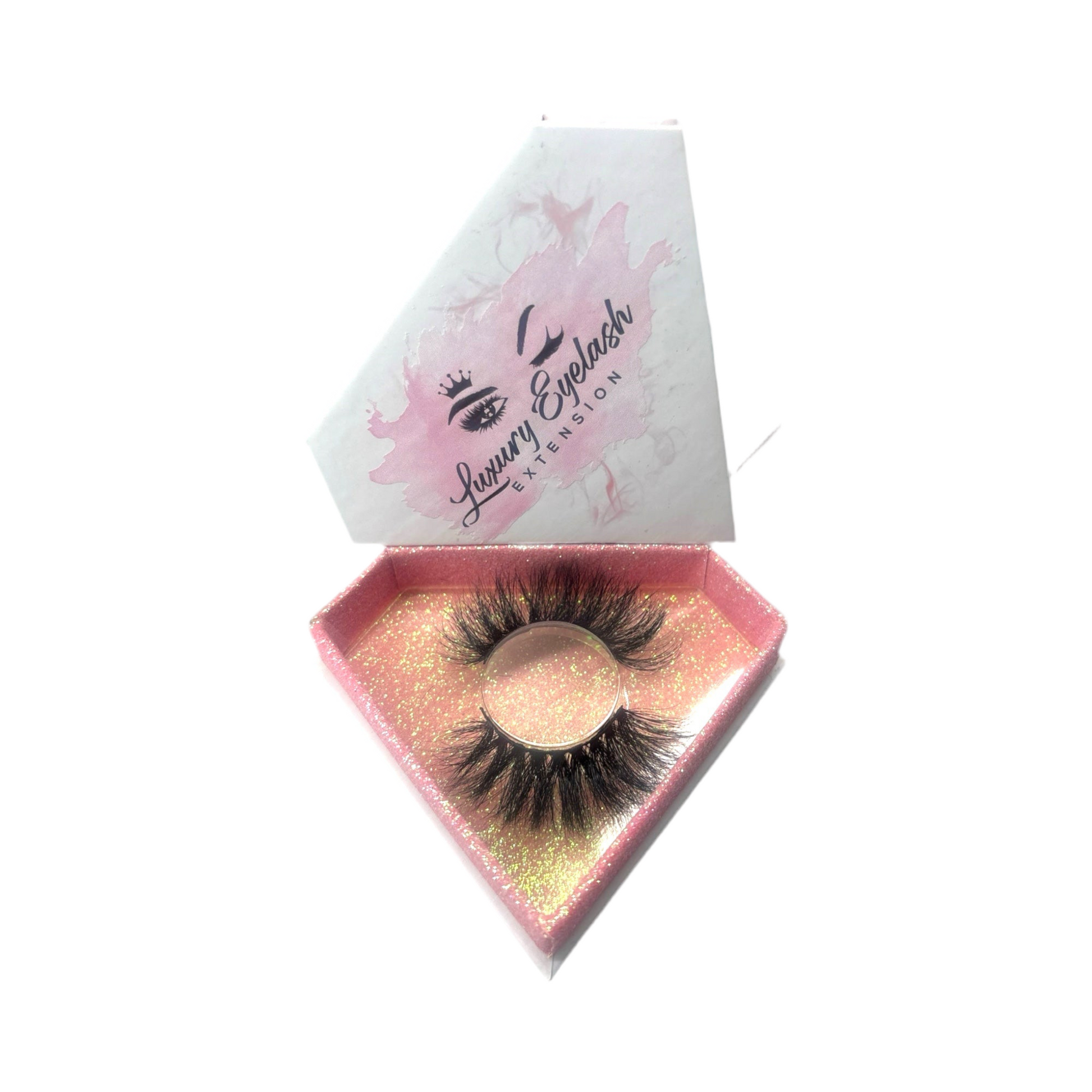 Hand-made false eyelash product made of 100% real mink fur with 25mm length and natural volume in a pink glittery diamond-shaped box.