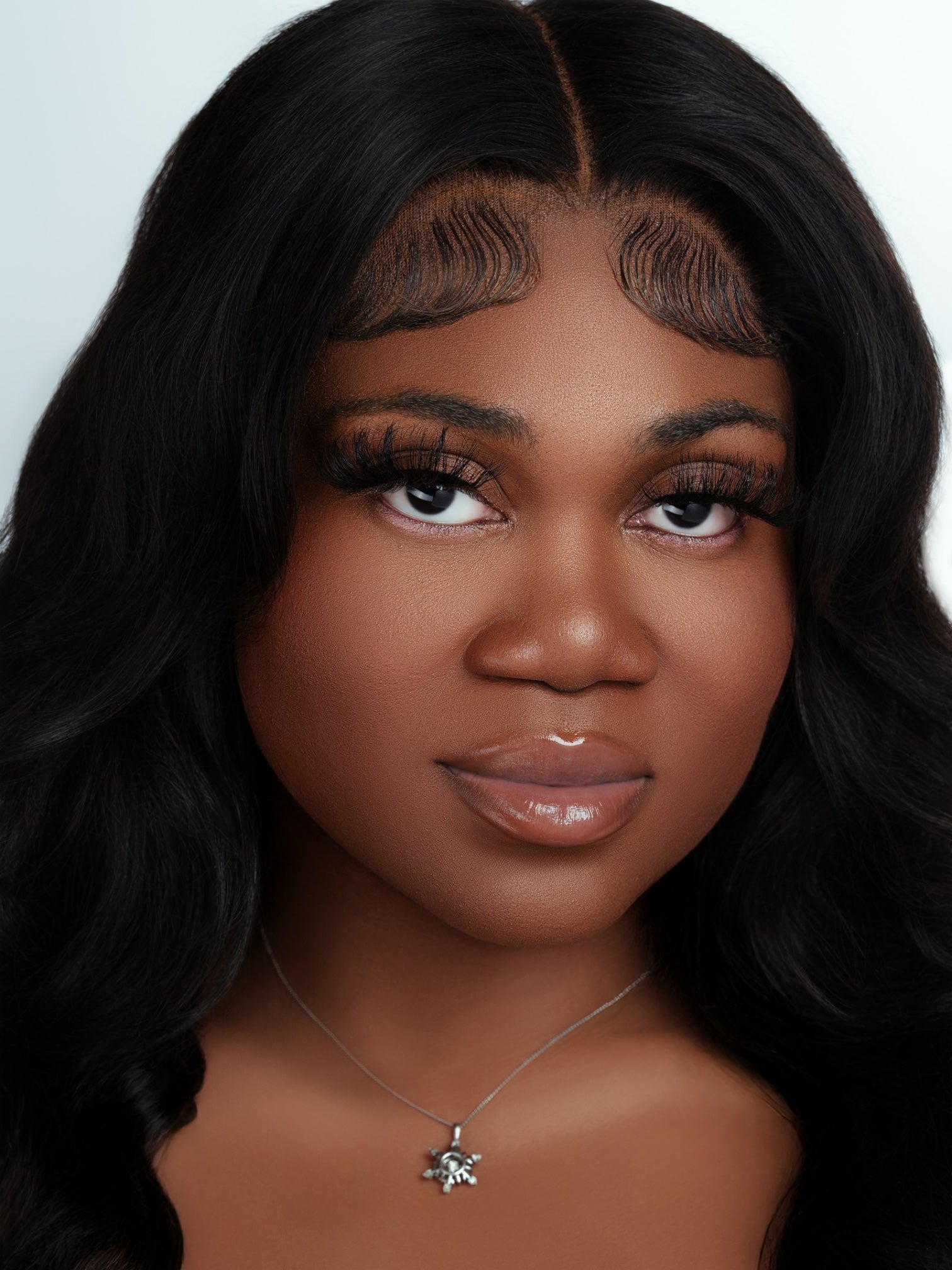 Close-up of a woman wearing luxurious real mink lashes from Lucy Lash Box enhancing her natural beauty with a soft, feathery look.