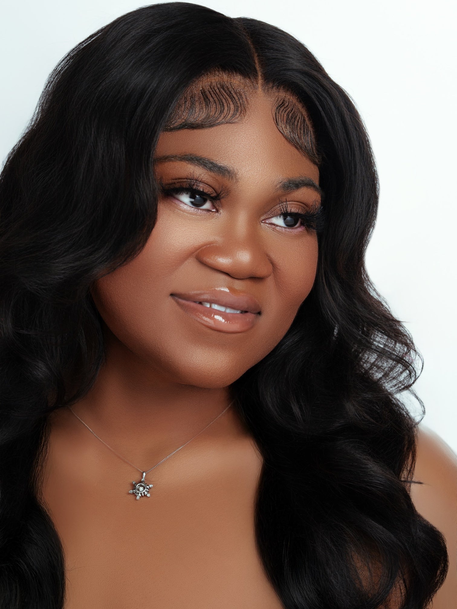 close-up of a woman wearing 25mm real mink lashes with soft, natural, and full appearance