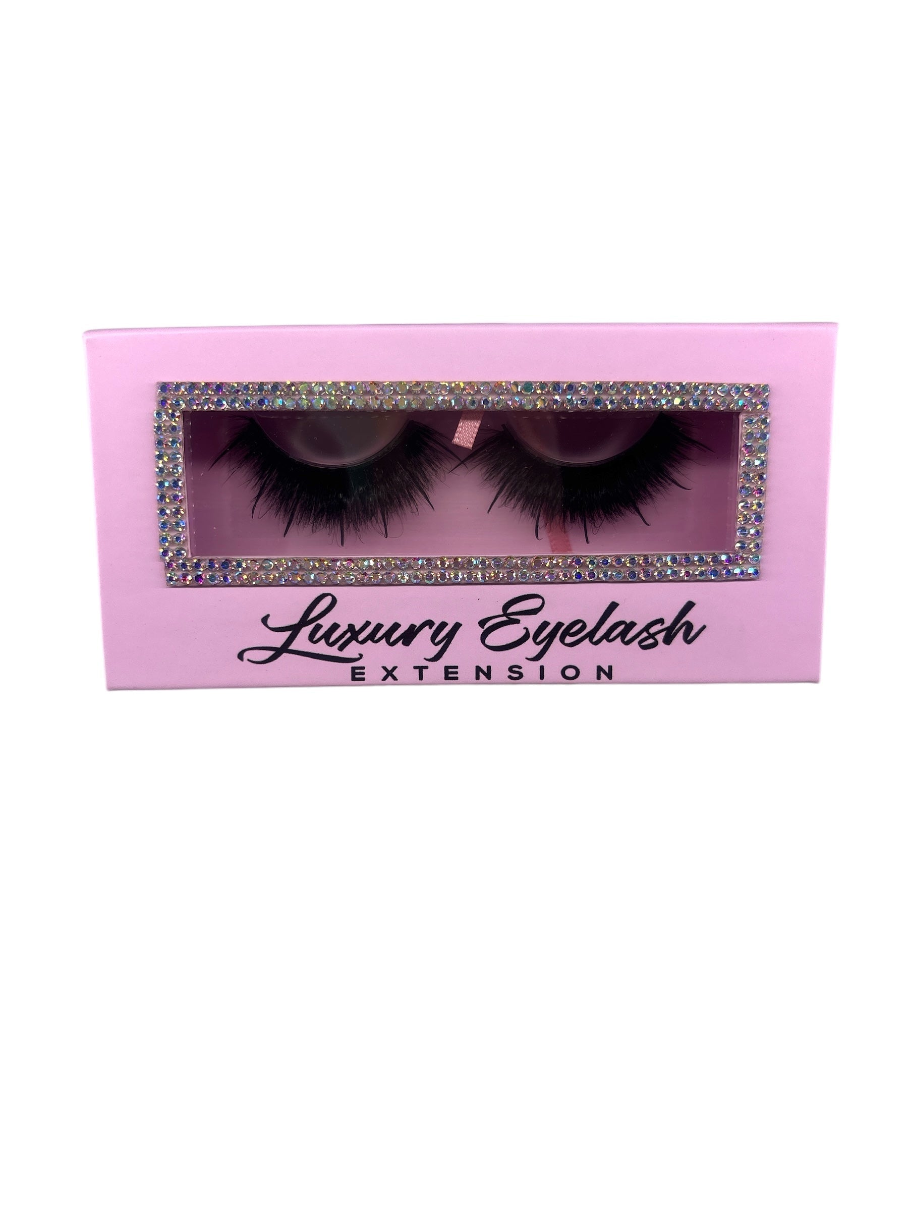Luxury eyelash extension strip in pink packaging with rhinestone detail.