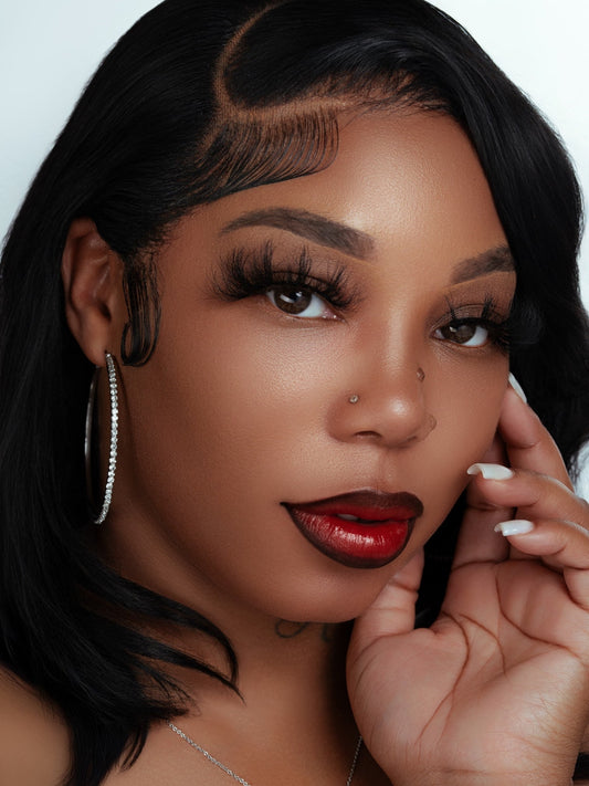 Close-up of a woman wearing luxurious 35mm real silk handmade false eyelashes with voluminous, natural-looking length and thickness.