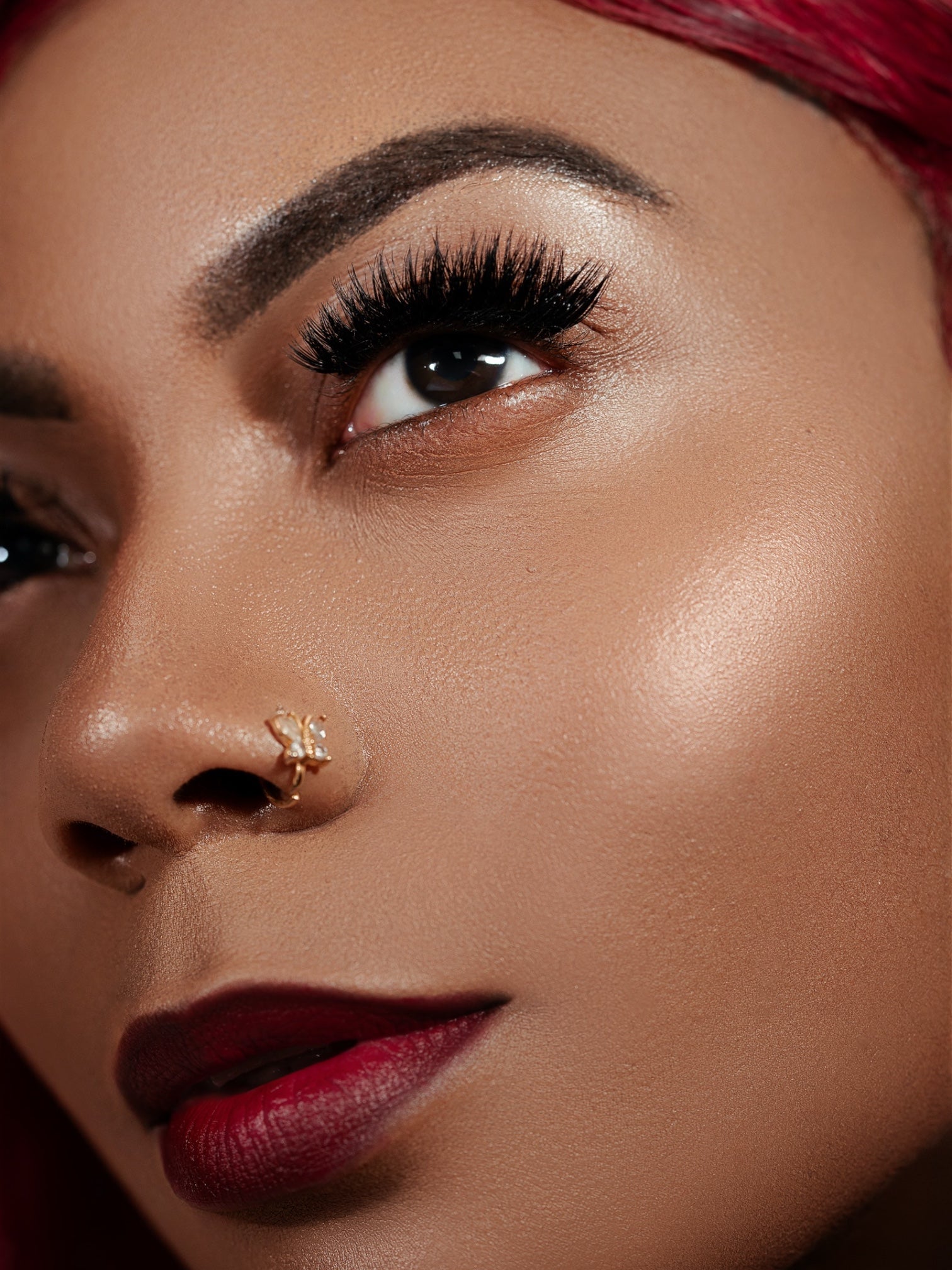 Close-up of a woman's eye with luxurious mink cluster eyelash extensions enhancing length and volume, focusing on Clusters DY042 lashes.